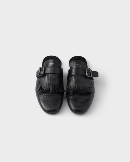 Prada Shuffle Antiqued Leather Mules with Buckled Strap and Fringe