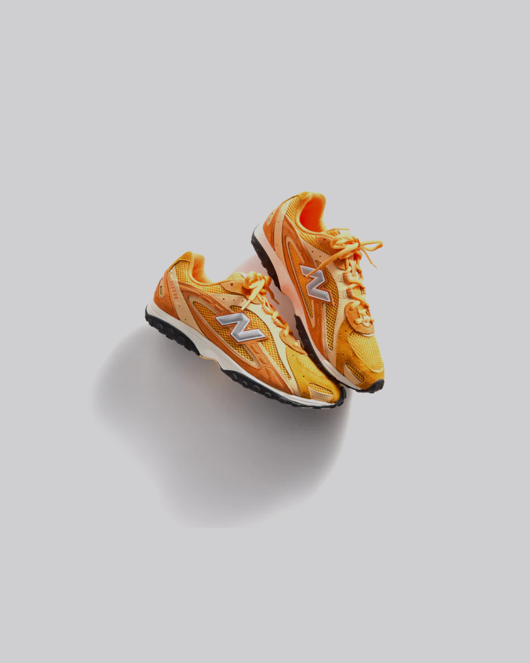Kith x New Balance 204L “Sunburst” Sneakers