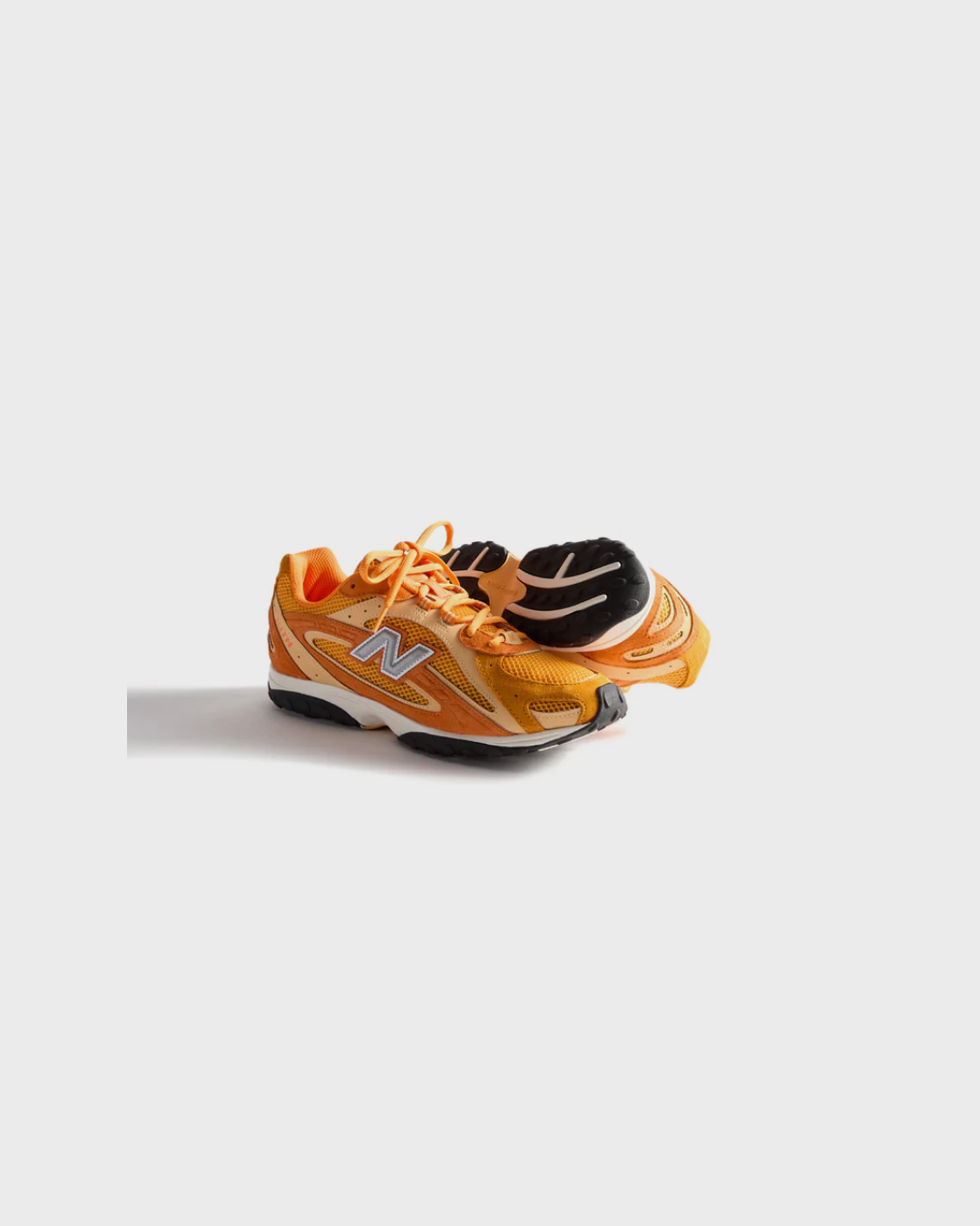 Kith x New Balance 204L “Sunburst” Sneakers