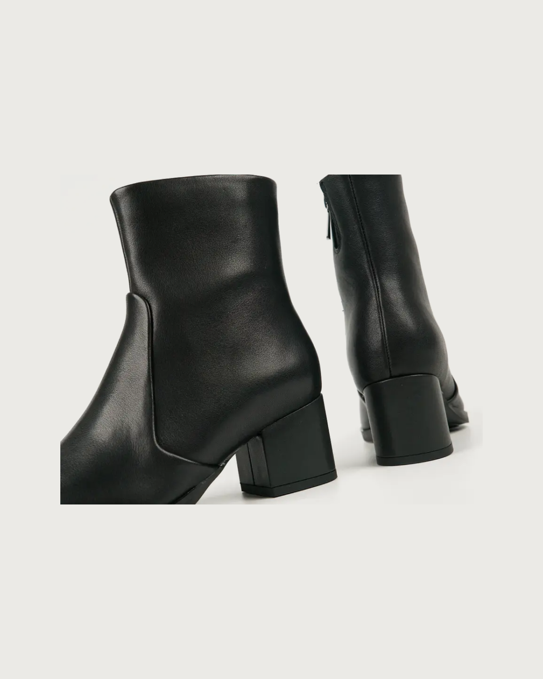 Heeled Leather Ankle Boot in Black