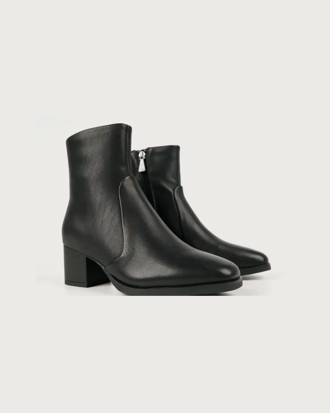 Heeled Leather Ankle Boot in Black